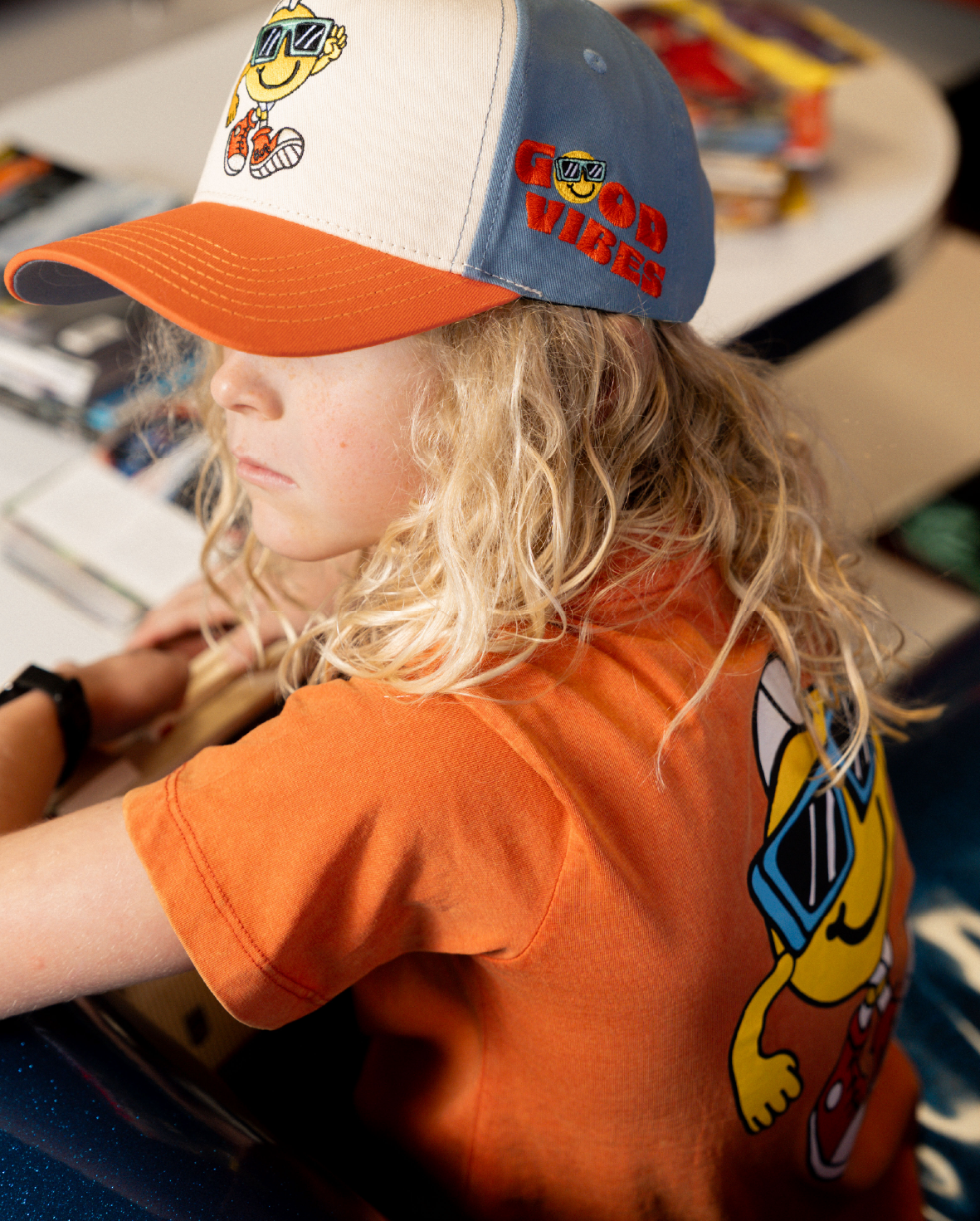 Band of boys washed orange tshirt with fun good vibes graphic with Mohawk and sunglasses