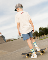 Band of Boys beige tshirt with blue and green stripes and skateboard graphics